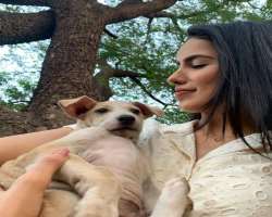 She is a pet lover. She is very kind to them and enjoy their company.